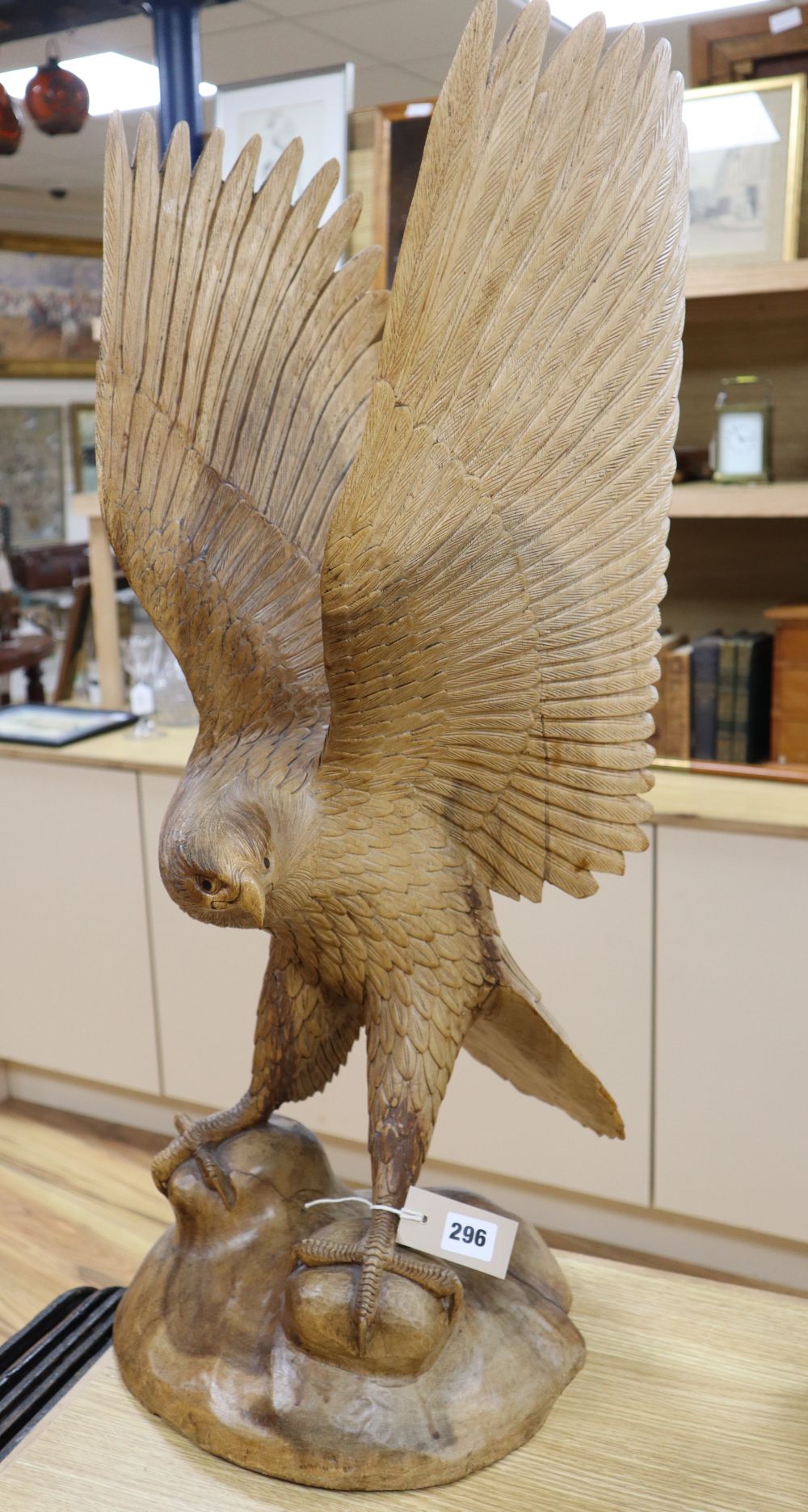 A contemporary carved wood model of a Golden Eagle